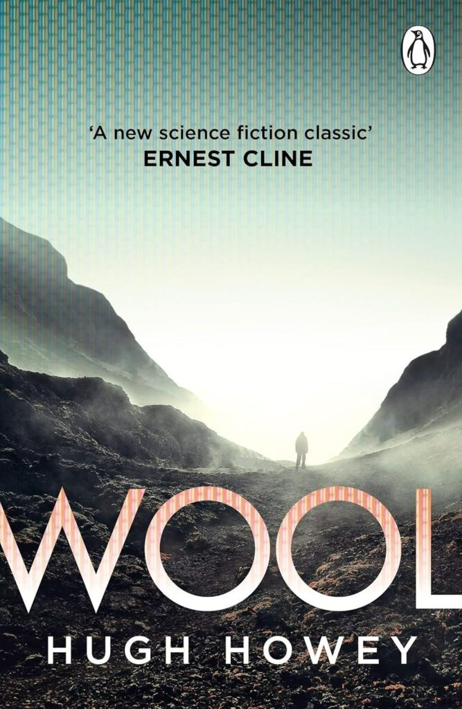 The cover of Wool, by Hugh Howey. In the fore-to-midground a barren, rocky landscape is seen, with hills rising to both sides of the cover. In the middle, and in some distance, stands a human figure with its back to the reader. A bright light shines into the valley. The further up one looks the more the view is overlaid with CRT matrix, its red-green-blue slits clearly visible on the upper side. In the lower part, laid over the rocky terrain, is the name of the book written, with a similar effect: bright on the bottom, a CRT-matrix clearly visible on the top of the letters. The author's name is written in bright letters below.