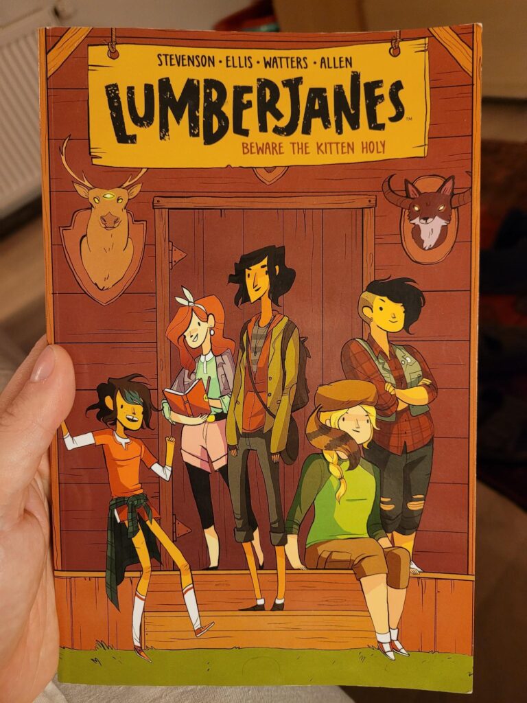 The cover of Lumberjanes: the heroines in front of a cabin.